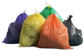 Colorful garbage bags in a pile for curbside cleanups